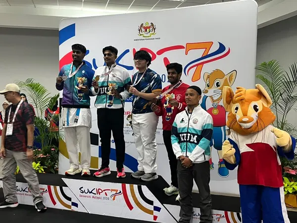 Derren Nagenthiran on the podium with his silver medal at the national university games 2026