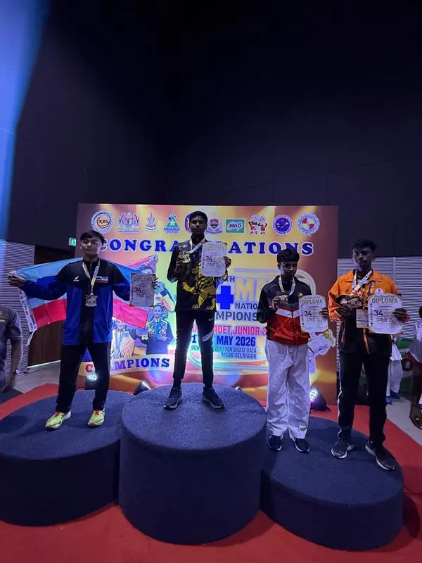 Samson Kendrick on top of the podium at the National Karate Championship 2026